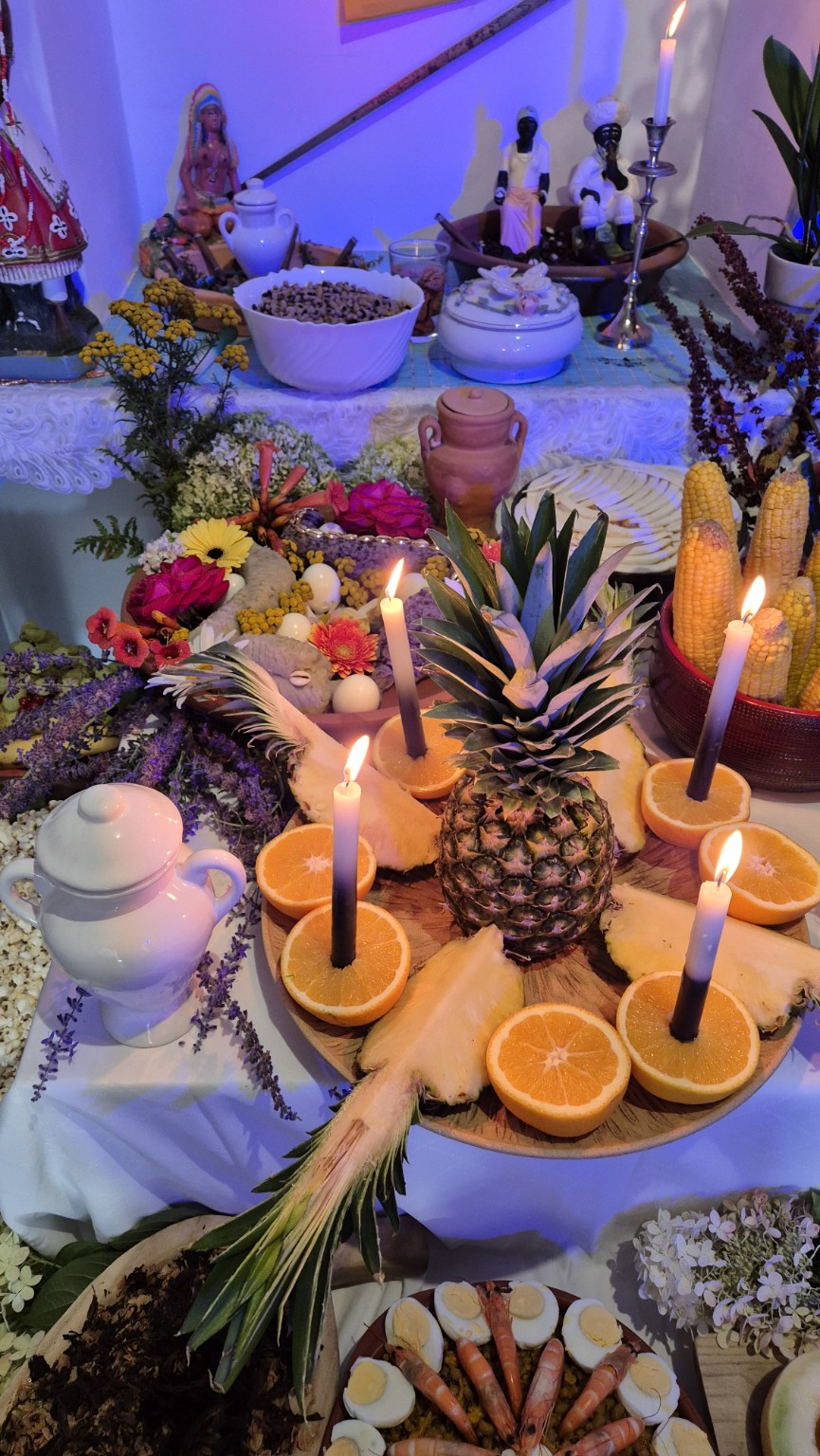 Bougies et offrandes de la Comida de Santo